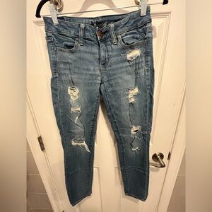 AE Women’s Distressed Blue Jean Jeggings